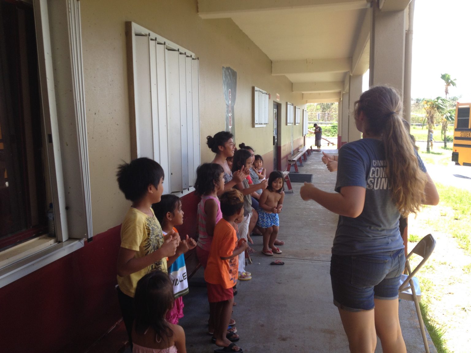 Rose with local Saipan village children.